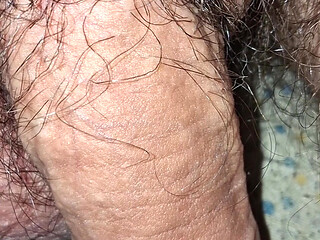 Soft to hard cock in close-up
