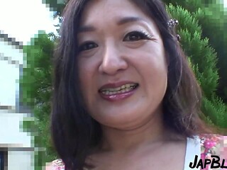 Japanese MILF enjoys doggy style fucking