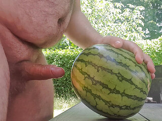Horny nudist fuck melon at home in the garden