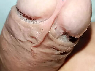 Desperate pissing in new pink underwear, big and venomous penis, close-up
