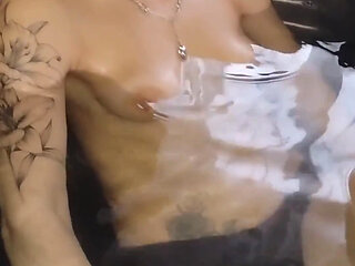 Relaxing in the Jacuzzi, They're Massaging My Breasts