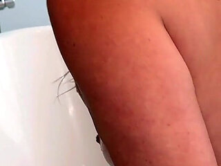 Fun in the Tub with a Dildo