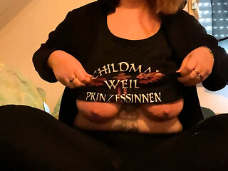 MILF with big tits reads fan fiction in glasses