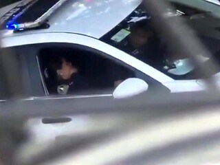 Female Officer Cums in Squad Car