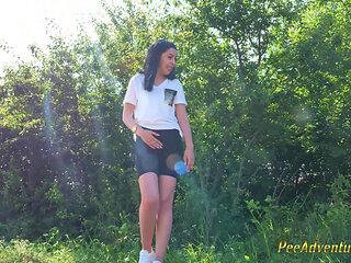 Sexy Brunette Trying Hard to Empty Her Bladder Outside, Then Quick Pee Next to a House in Construction