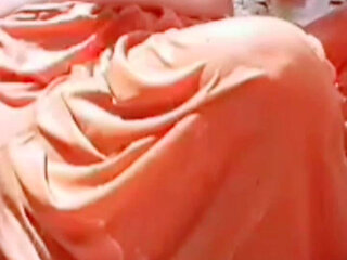 While Bathing, the Village Woman Is Taking a Bath Naked After Taking off Her Clothes Completely