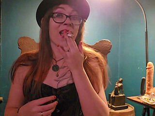 Smoking while wearing a purple corset, gloves, and a hat