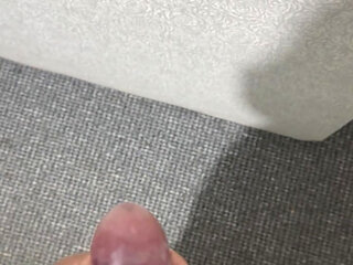 Boy masturbating in condom