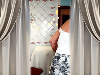 Cheerful Housewife Lukerya in a Homely Atmosphere in the Kitchen.