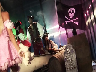 Two horny pirate chicks get it on behind a window