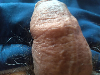 Young man with oil has a fetish for his penis