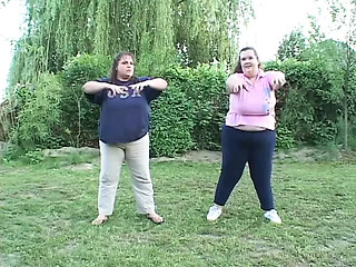 Large ladies explore each other's wet love holes in a lesbian yoga class