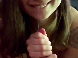 Big tit brunette sucks a big cock blowjob POV