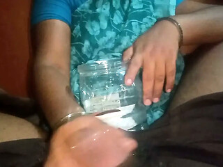 Telugu housewife cleans old man's cock with water and gives a sensual handjob.