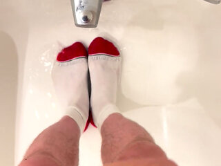 Jerking off into a wet sweaty sock in a bathtub, wet feet, dirty shoes, dirty wet smelly socks, water on feet