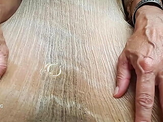 Hot mom pees in see-through shirt with pierced nipples