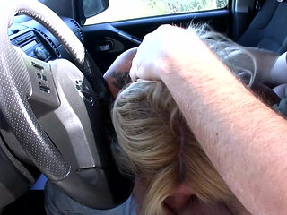 Blonde chick drains big pecker in the car