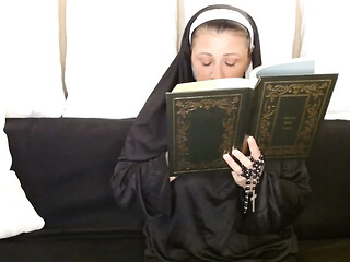 Naughty nun smokes a cigarette in church