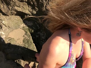 Model blows photographer on the beach and swallows cum