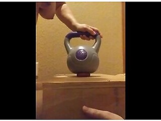 Wife Crushes Balls With Kettle Bells