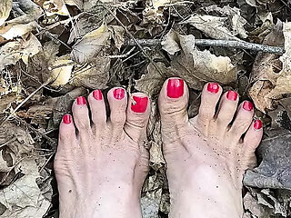 Melove Sexy Small Feet with Red Toe Nails in Leaves