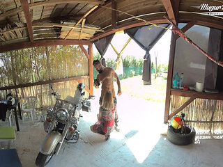 Regina Gold On Motorcycle