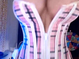 Brunette MILF teases on cam with big tits
