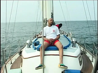 Black beauties ride his big cock in a hot boat setting