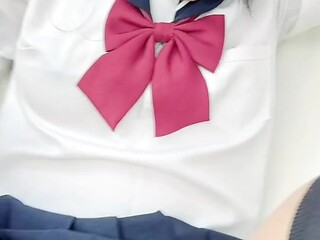 Petite Japanese school girl gives a cute and innocent blowjob
