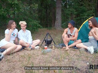 Two girls rim each other's asses at a cozy campsite