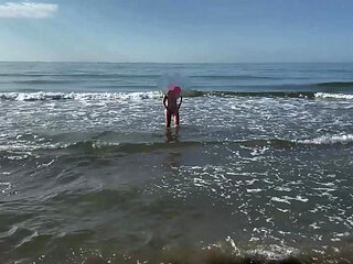 A hotwife and her cuckold on the beach