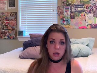 Blonde teen slut plays with a toy banana