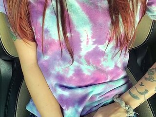 Outdoor solo masturbation scene with curly blonde