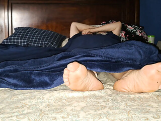 Girlfriend gets footsie while recovering from a good fucking