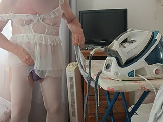 Ironing in a little white outfit