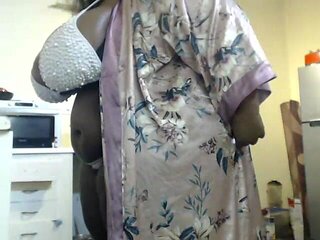 African Stepmum Stripteasing and Masturbating at Then Kitchen