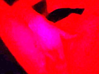 Amateur sexy ebony plays with LED lights while masturbating and fingering
