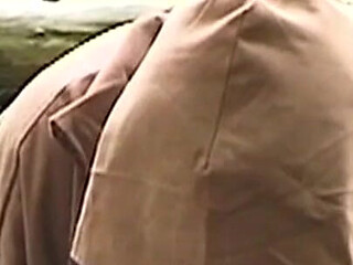 Hooded Mature Man Endures Clamps and Heavy Chains