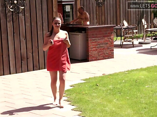 Tattoed girl sucks a hard cock in the backyard to a cumshot