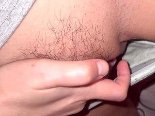 Mature MILF rubs her hairy pussy and moans loudly as she cums from