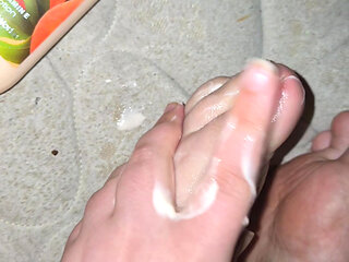 messy putting lotion on my clean chubby feet