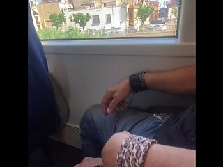Blonde MILF accidentally gets her handjob cammed on the train
