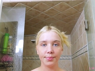 Captivating blonde model took a shower