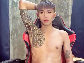 Pinoy Horny Inked Twink Playing with His Masturbator Toy