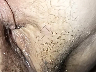 Close-up on his cock as she rides it