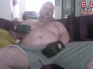 Daddy Wanks in his black leather gloves