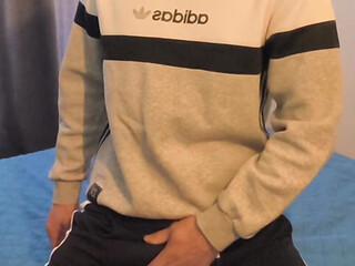 Guy jerking off in sports shoes