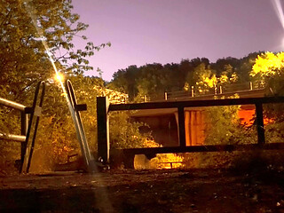 Undressing in view of traffic and walking naked in the road