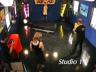 Blonde slut gets gangbanged hard by multiple men in live scene