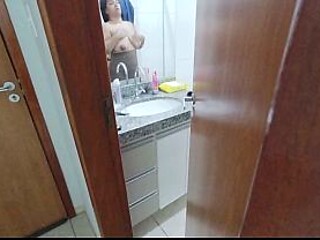 Latina stepmom films naughty cousin filming young country girl in the shower.
